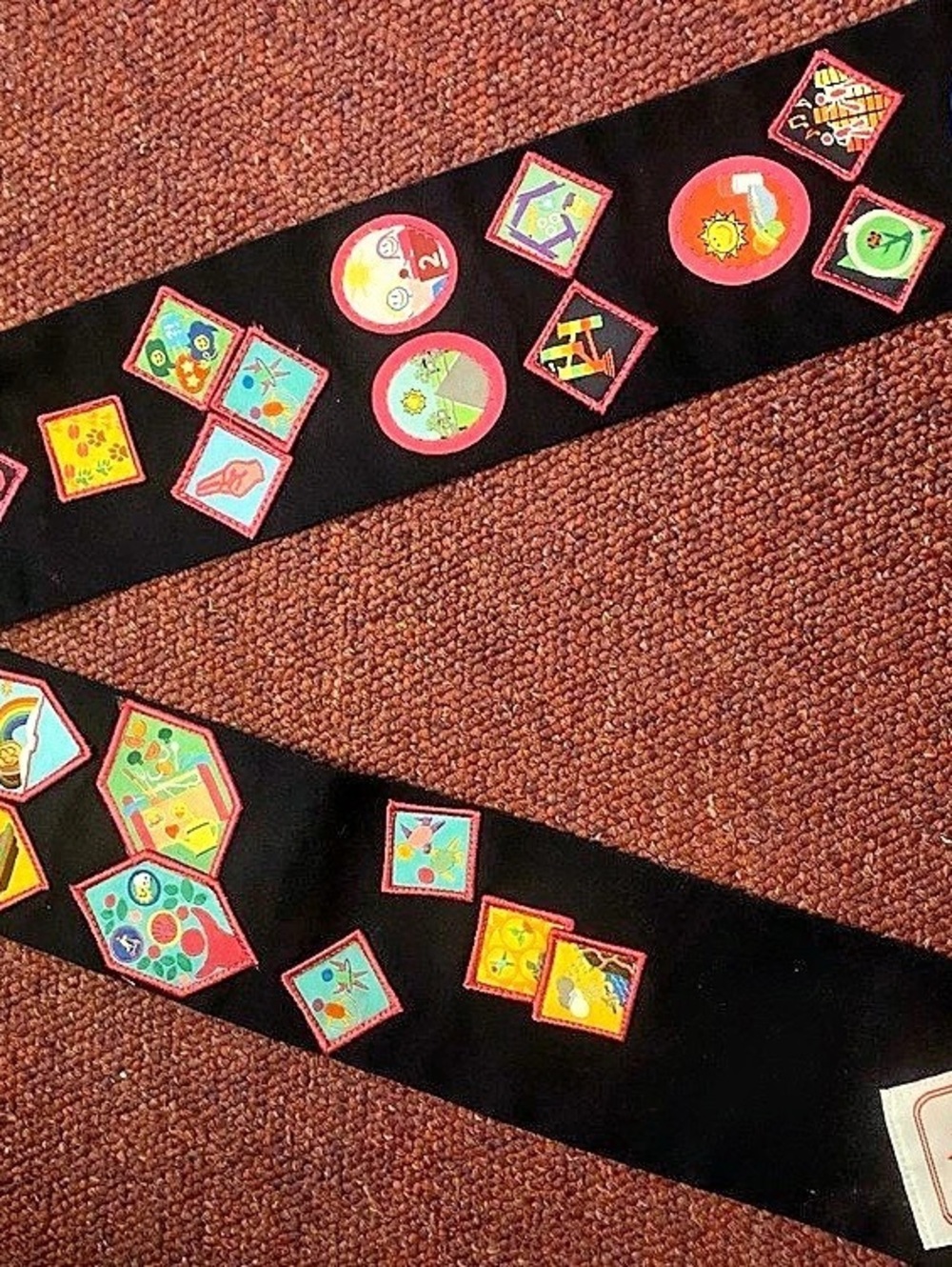 Girl guide sash with badges